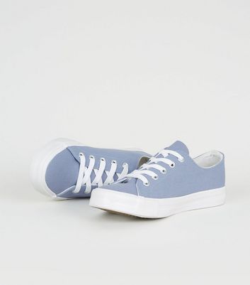 blue canvas trainers