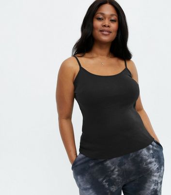https://media2.newlookassets.com/i/newlook/653900901/womens/clothing/tops/curves-black-longline-strappy-cami.jpg