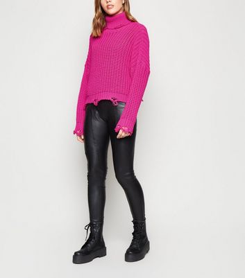 bright pink roll neck jumper