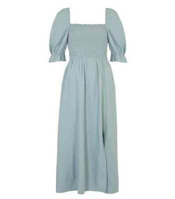 light green dress with puff sleeves