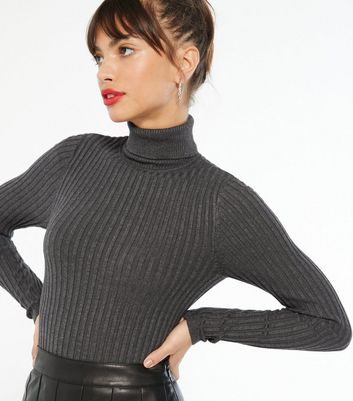 dark grey roll neck jumper