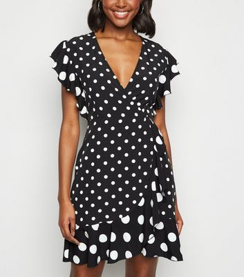 Robe noire à online pois