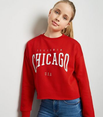 girl in red sweatshirt