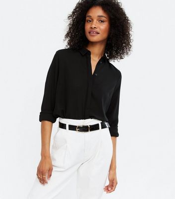 black long sleeve button top