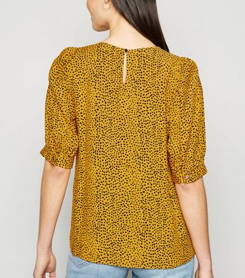 mustard spotty blouse