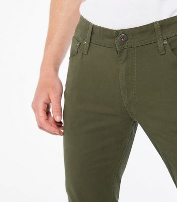 green slim fit jeans