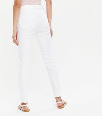 white ripped super skinny jeans