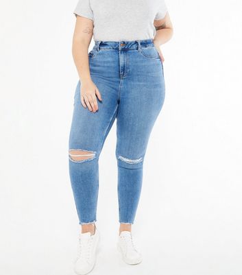 high waisted blue skinny ripped jeans