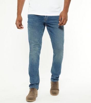 mens mid wash slim jeans