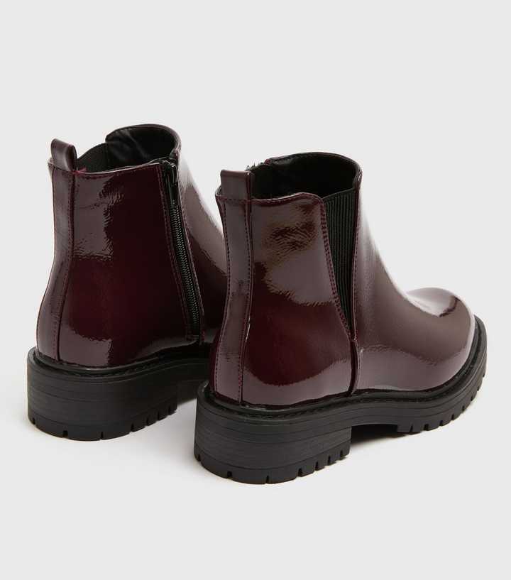 dark red patent chunky cleated chelsea boots