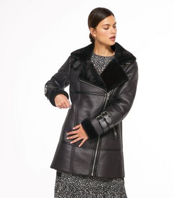 star julien macdonald black coat