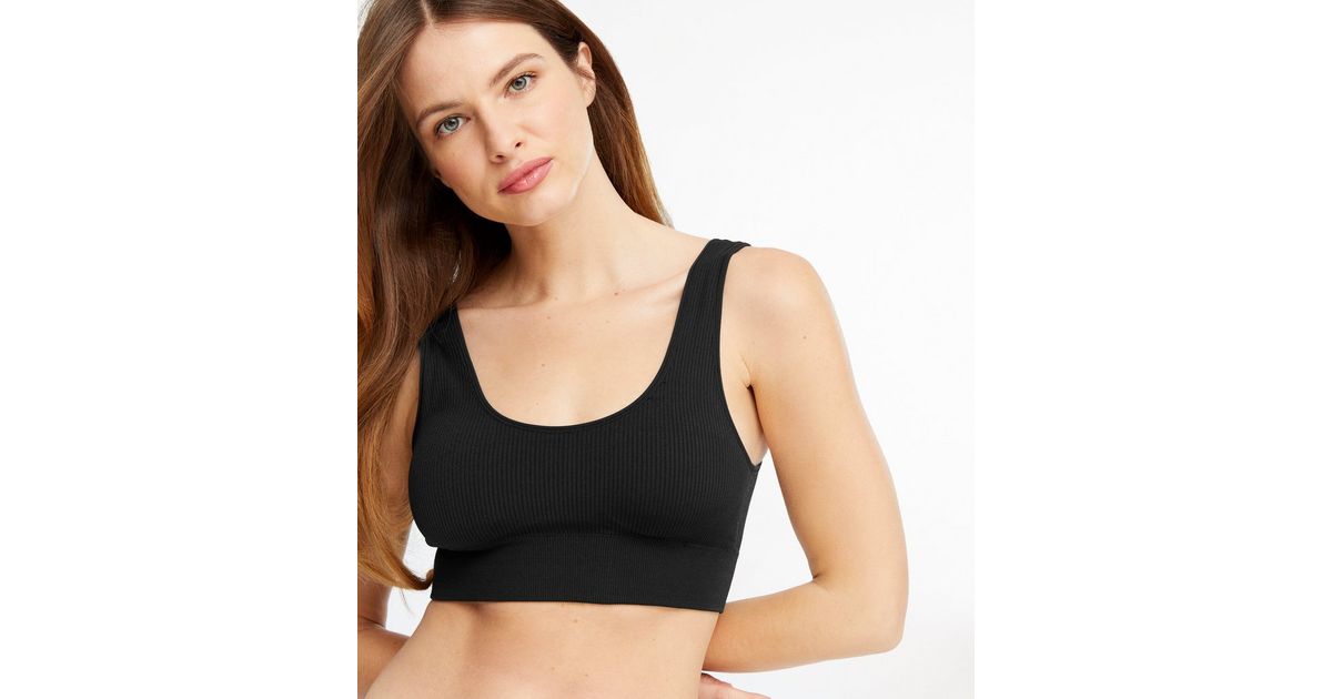 https://media2.newlookassets.com/i/newlook/664515501/womens/clothing/lingerie/black-ribbed-seamless-crop-top-bra.jpg?w=1200&h=630