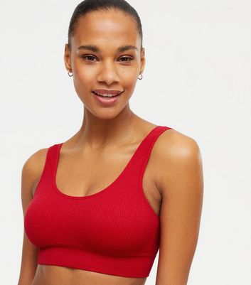 https://media2.newlookassets.com/i/newlook/664515560/womens/clothing/lingerie/red-ribbed-seamless-crop-top-bra.jpg