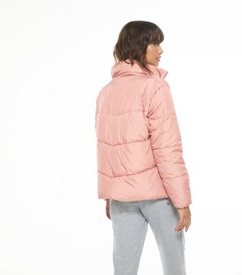 pale pink puffer coat