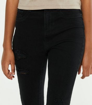girls black ripped jeans