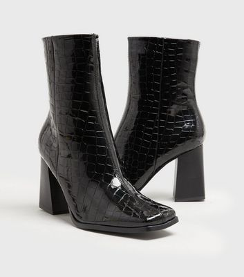 black flared heel boots