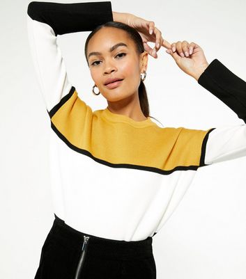 Mustard coloured outlet jumper