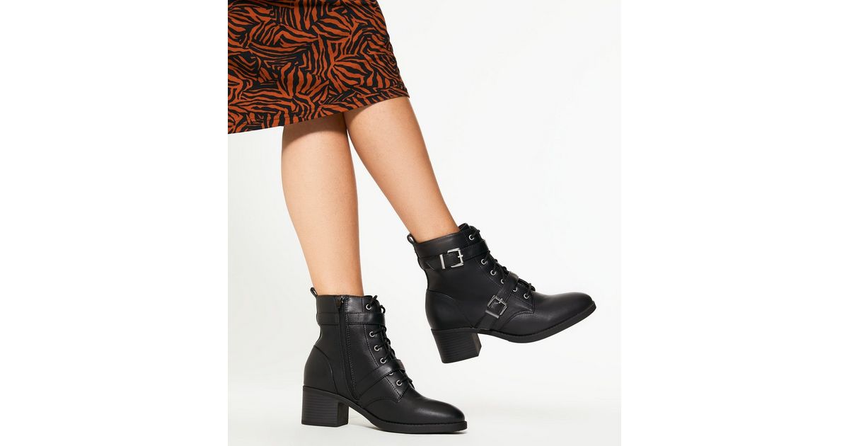 black buckle heel boots
