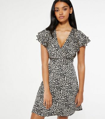 white leopard print wrap dress