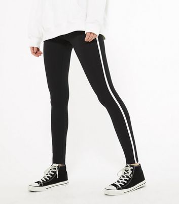 black leggings with white stripe down the side