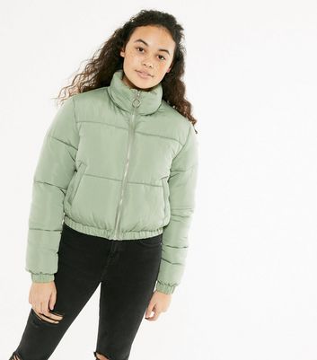 green puffy jacket