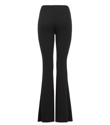 Image of Black Ribbed Flared High Waist Trousers New Look