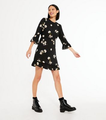 black daisy print frill tea dress