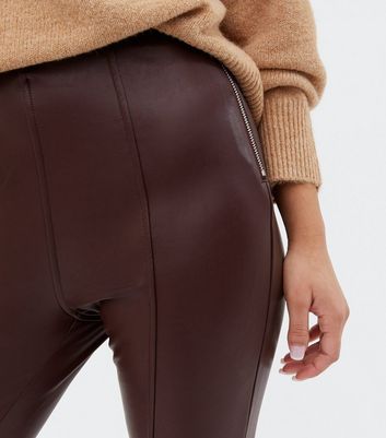 Click to view product details and reviews for Petite Burgundy Coated Leather Look Zip Leggings New Look.