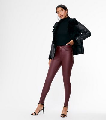 maroon leather look trousers