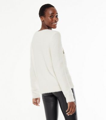 fluffy white jumpers