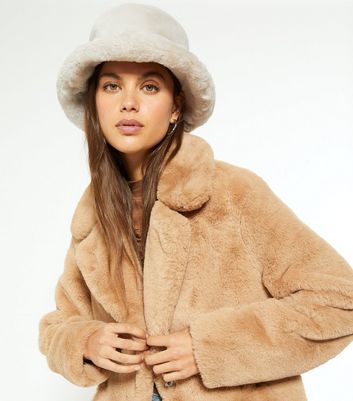 Cream faux online fur hat