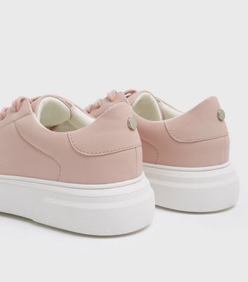 White trainers with pink on sale back