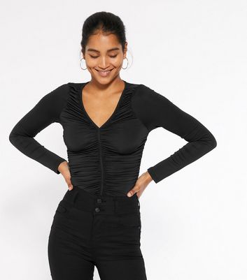 black ruched long sleeve bodysuit