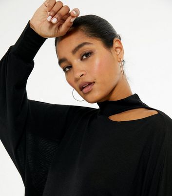 black jumper with cut out shoulders