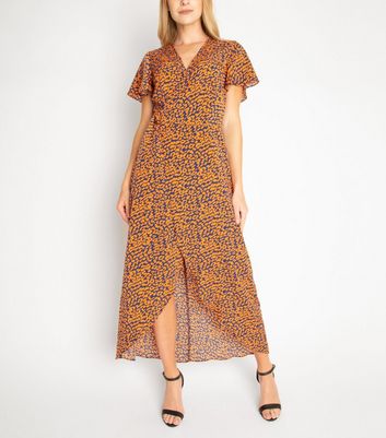 new look midi wrap dress in rust