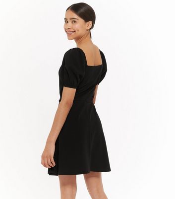 black puff sleeve skater dress