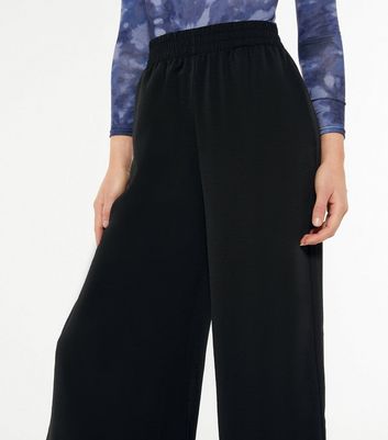new look split leg trousers