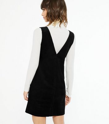 black corduroy pinafore dress