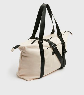 cream holdall