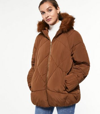 tan puffer coat with fur hood