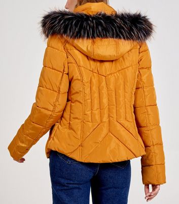 mustard puffer coat