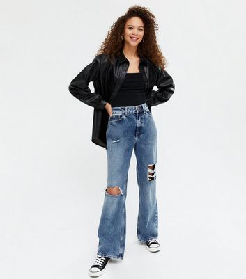 ripped 90s jeans