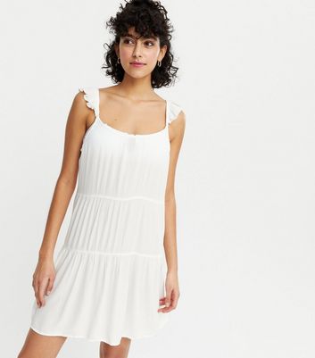 white cheesecloth dress