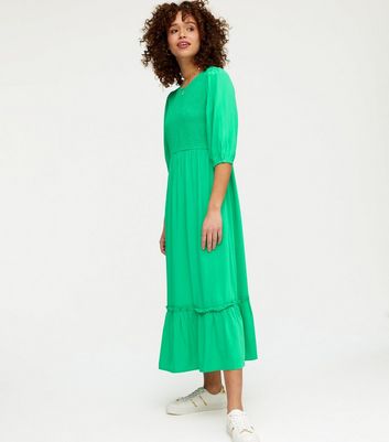 green shirred midi dress