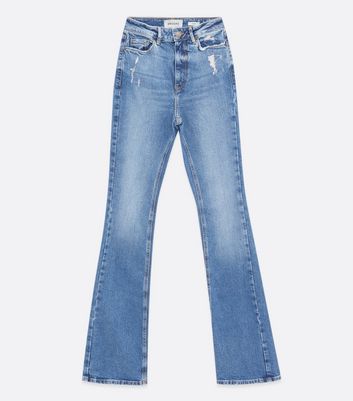 New Look Tall flared jeans in mid blue - ShopStyle