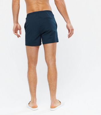 Click to view product details and reviews for Mens Only Sons Navy Tie Waist Swim Shorts New Look.