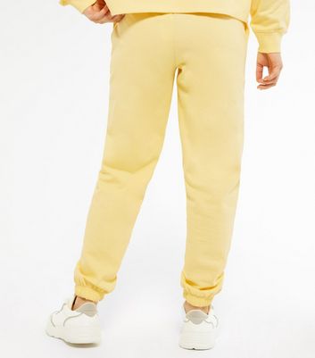 pale yellow sweatpants