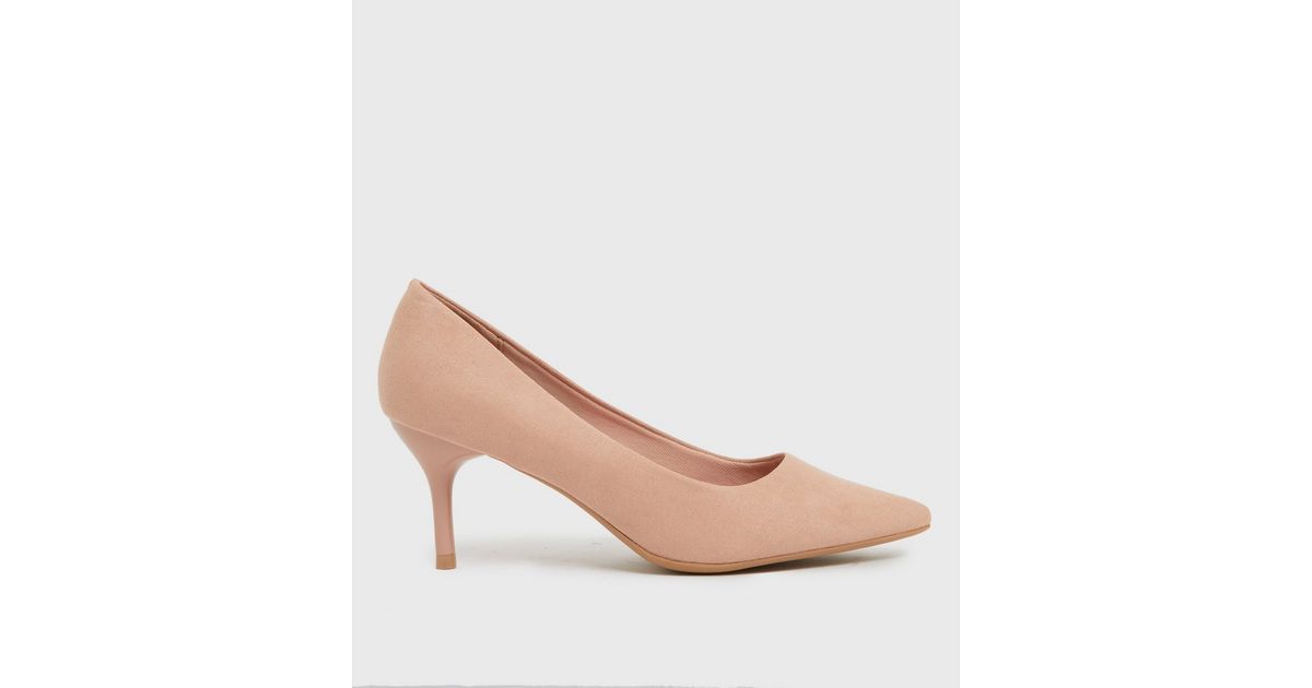 cream pointed stilettos