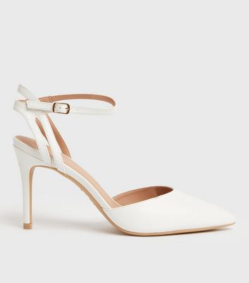 white pointed heels
