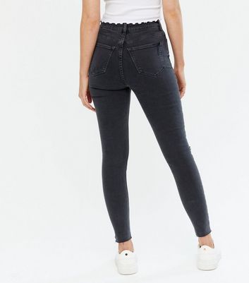 faded black skinny jeans womens